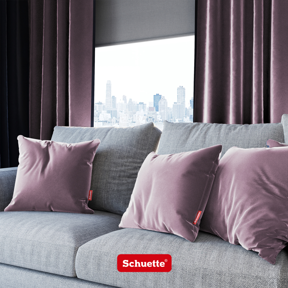 Velvet decorative cushions on a sofa in the living room