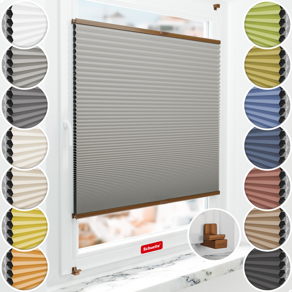 Estores térmicos opacos de nido de abeja Schuette instalados en la ventana sin taladrar